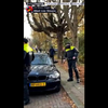 Coronacapuchonnetjes vs politie in Den Haag