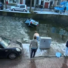 Heldstudent redt vrouw uit zinkende auto in Delft