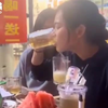 Two girls, one beer