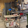 Stageloper aan het lassen 