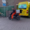 Scooter lenen van pizzakoerier