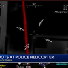 Gek op balkon schiet op politiehelikopter