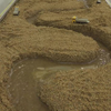 Hoe werkt erosie in een rivier