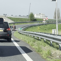 Scootmobiel op rondweg