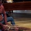 Spiderman speelt de piano