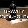 Gravity Soda Holder