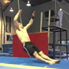 Zittende achterwaartse salto