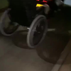 Rolstoel achter de scooter