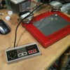 NES controlled Etch-a-sketch.