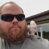 Zieke papegaai geeft geen fuck