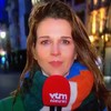 Zoenmeneer in België zoent verslaggeefster