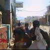 CNN-reporter redt jochie uit rellen in Haiti