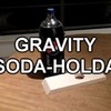 Gravity Soda Holder